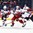 BUFFALO, NEW YORK - JANUARY 5: The Czech Republic's Jakub Lauko #20 battles with USA's Dylan Samberg #12 and Adam Fox #8 for the loose puck during bronze medal game action at the 2018 IIHF World Junior Championship. (Photo by Matt Zambonin/HHOF-IIHF Images)

